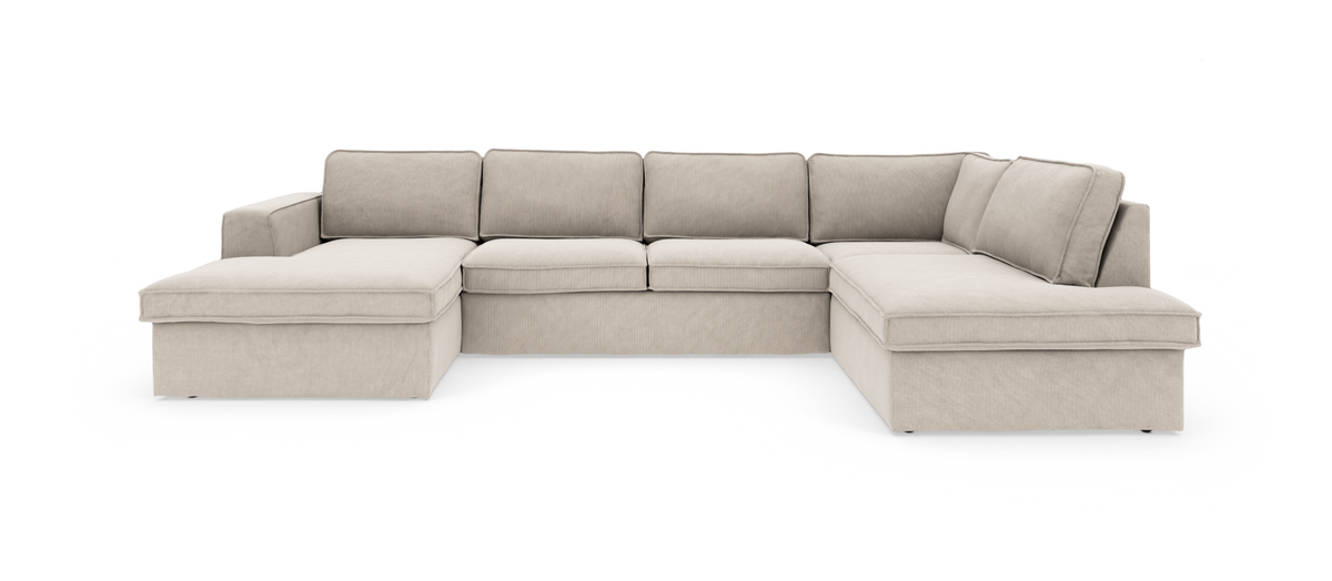 Lysebeige U-formet modulsofa med chaiselong i begge ender, frilagt mod hvid baggrund.