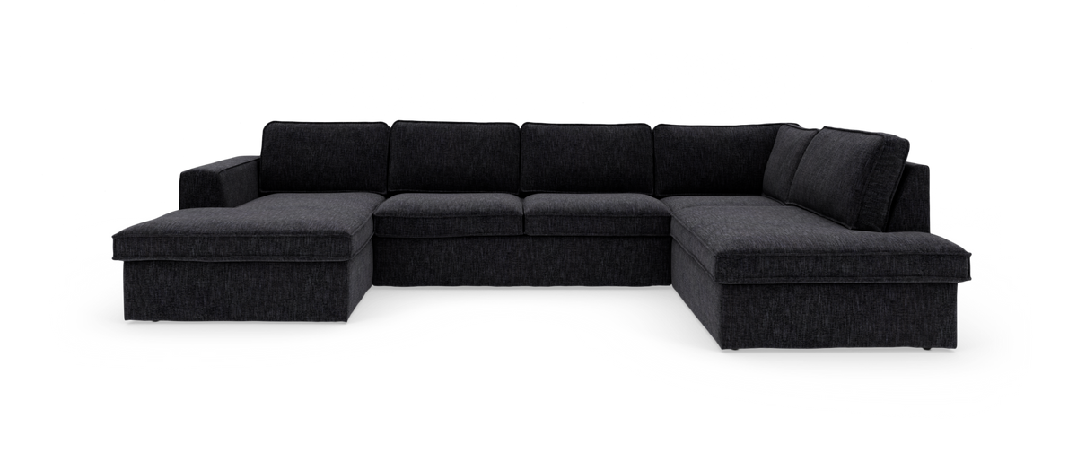 Stor U-formet modulsofa i mørkegråt stof med chaiselong i både venstre og højre side, frilagt på hvid baggrund.