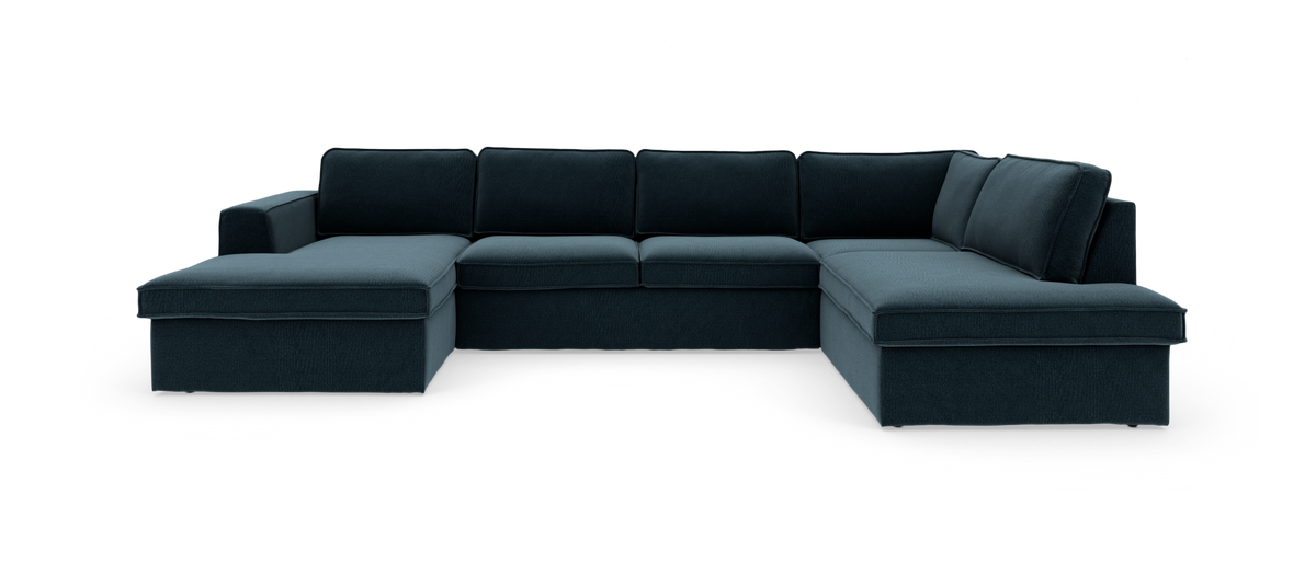 Mørk petrolblå U-sofa med chaiselong i begge ender, frilagt mod hvid baggrund.