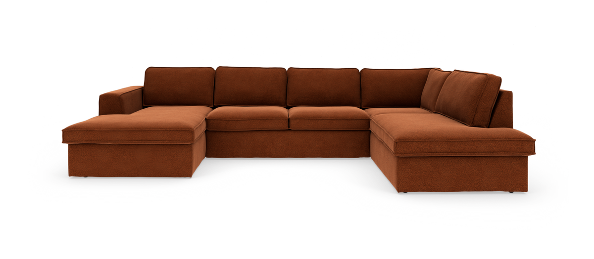 Modulær U‑formet hjørnesofa i rustbrunt stof med chaiselong i begge sider, frilagt på hvid baggrund.