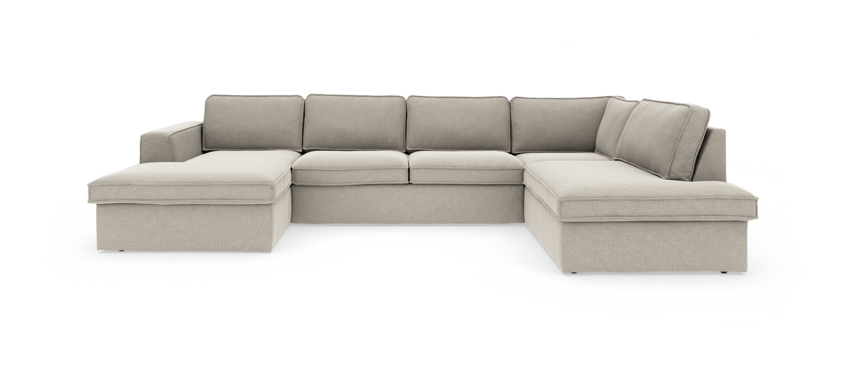 Beige U-formet modulsofa med chaiselonger på begge sider, frilagt på hvid baggrund.