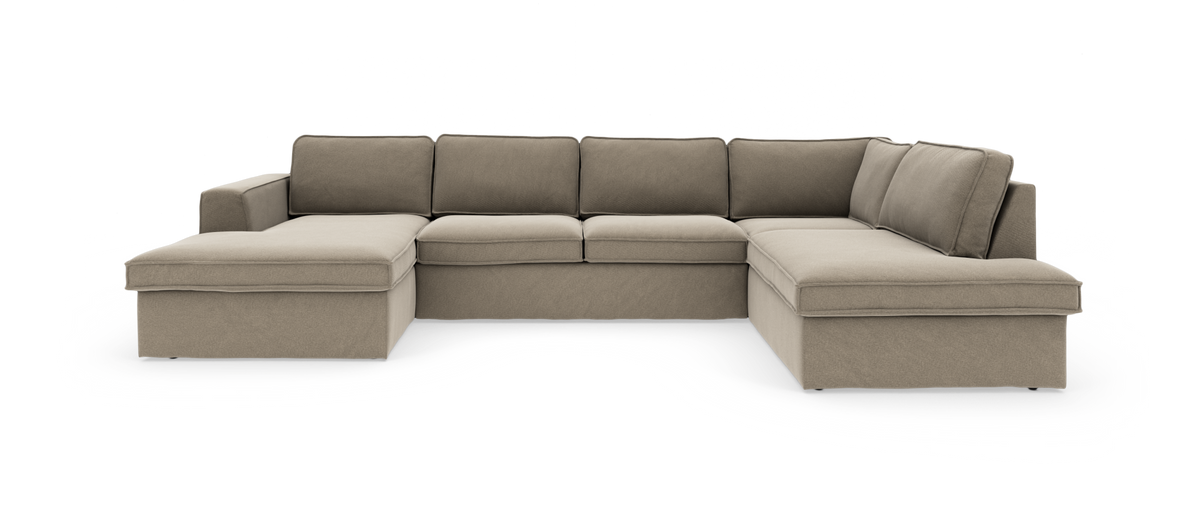 Beige modulsofa i U‑form med chaiselong i begge ender, frilagt på hvid baggrund.