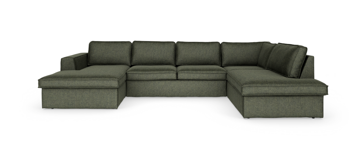 Mørkegrøn modulsofa i U‑form med chaiselong i begge ender, frilagt på hvid baggrund.