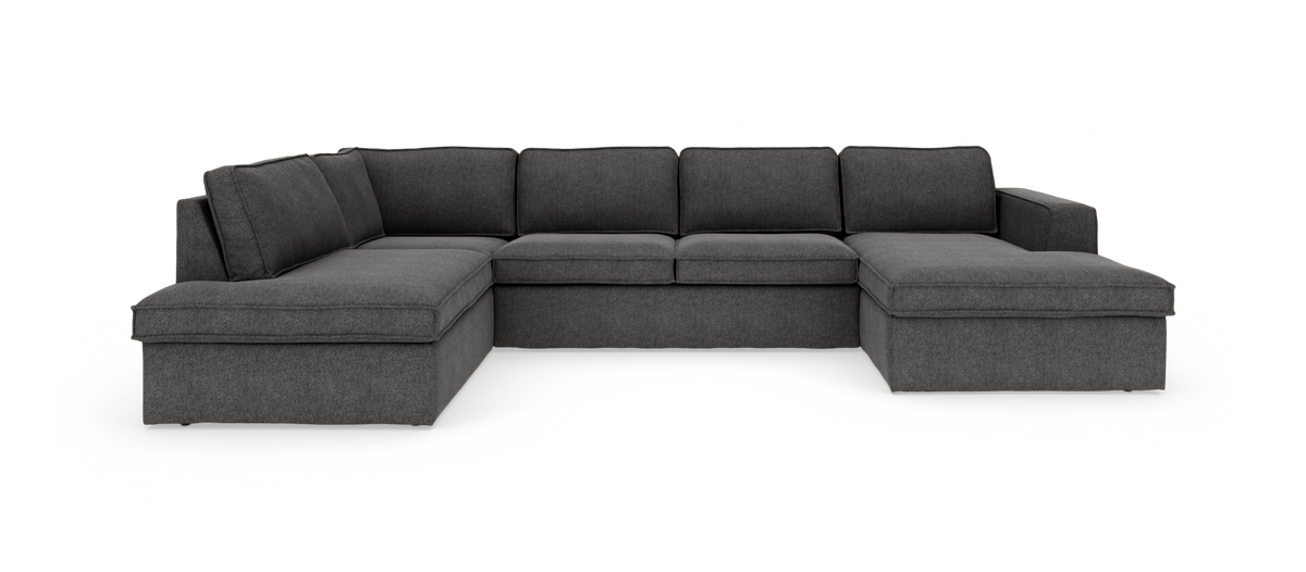 Mørkegrå U-formet modulsofa med chaiselong i begge ender.
