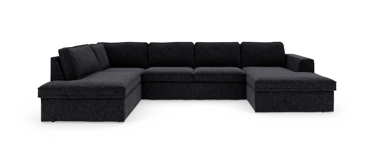 Stor U‑formet mørkegrå modulsofa i stof med chaiselong på både venstre og højre side.