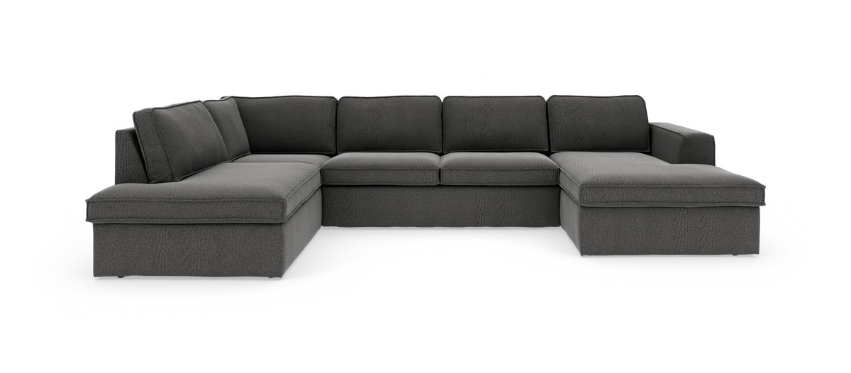 Mørkegrå U‑formet modulsofa med chaiselonger i begge ender, fritlagt på hvid baggrund.
