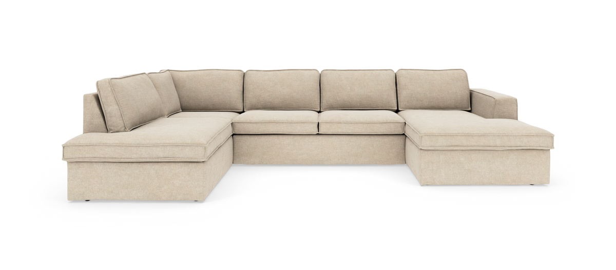Beige U-formet modulsofa med dobbelt chaiselong, rene linjer og løse ryghynder på hvid baggrund.