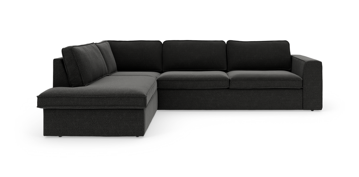 Mørkegrå L‑sofa med venstrevendt chaiselong og brede armlæn, moderne modulær hjørnesofa på hvid baggrund.
