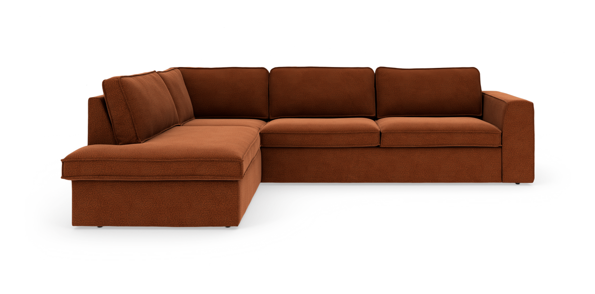 Modulær L-sofa med venstre chaiselong i rustfarvet stof, moderne og lav profil.