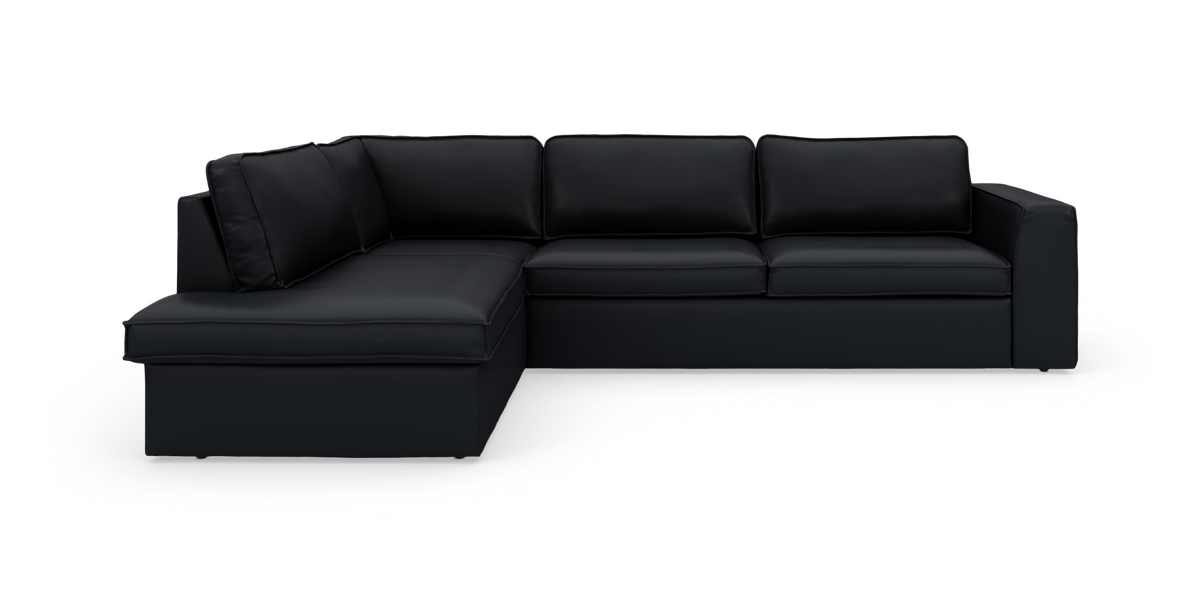 Sort L-formet hjørnesofa med chaiselong, frilagt på hvid baggrund.