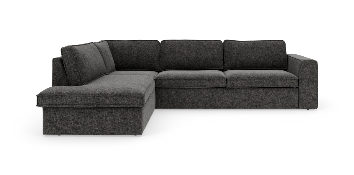 Mørkegrå L‑formet modulsofa med venstrevendt chaiselong i stof.