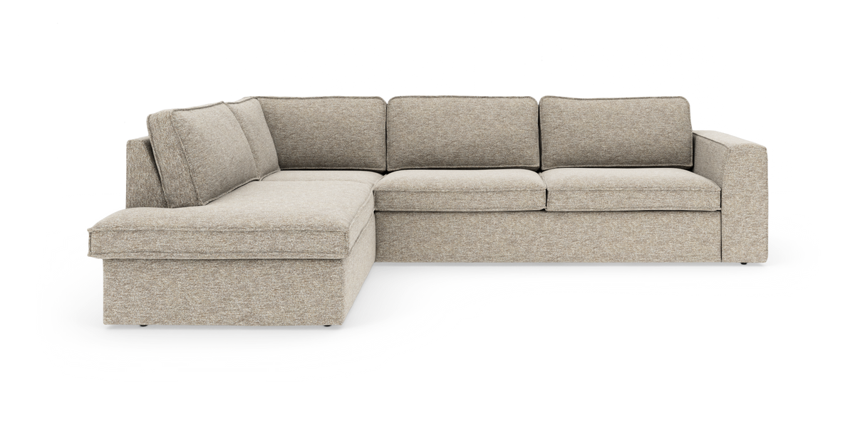 Beige L‑sofa med venstrevendt chaiselong, moderne og polstret i tekstil, frilagt på hvid baggrund.