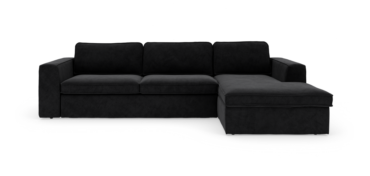 Sort modulsofa med højrevendt chaiselong, frontvisning, fritstående på hvid baggrund.