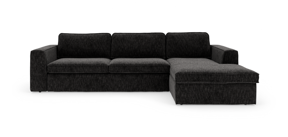 Mørkegrå hjørnesofa med højrevendt chaiselong, fritlagt på hvid baggrund.