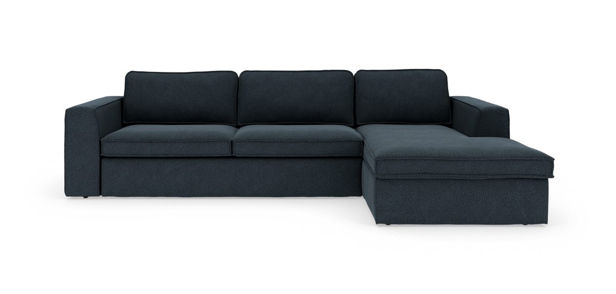 Mørkeblå hjørnesofa med chaiselong på højre side, stramt moderne design på hvid baggrund.