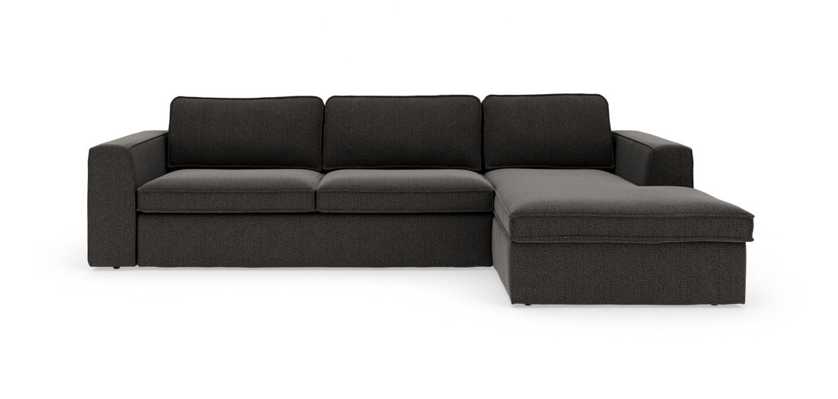 Mørkegrå hjørnesofa med chaiselong til højre, frontvisning på hvid baggrund.