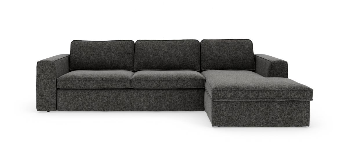 Mørkegrå hjørnesofa med chaiselong til højre, frilagt på hvid baggrund.