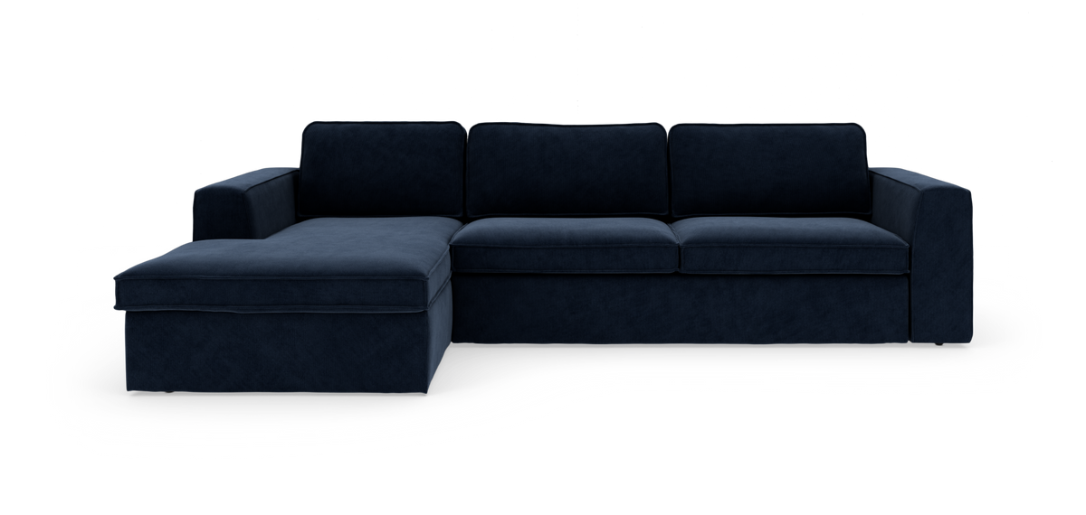Mørkeblå hjørnesofa med chaiselong til venstre, frilagt på hvid baggrund.