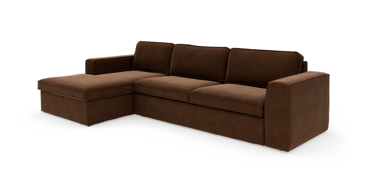 Brun L‑formet modulsofa med chaiselong til venstre, frilagt på hvid baggrund.