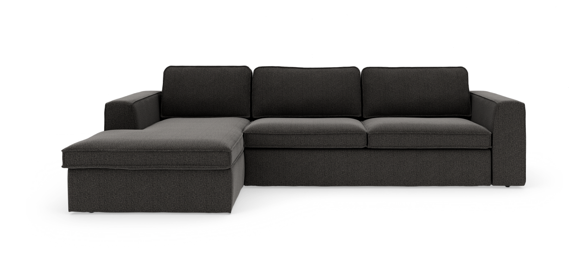 Mørkegrå hjørnesofa med chaiselong til venstre, fritstående mod hvid baggrund.