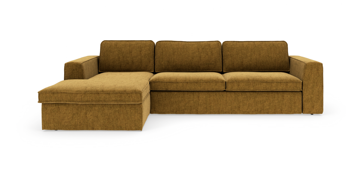 Modulsofa i sennepsgul tekstil med venstrevendt chaiselong, lige frontvisning på hvid baggrund.