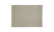 Beige rektangulært tæppe med subtil vævstruktur.