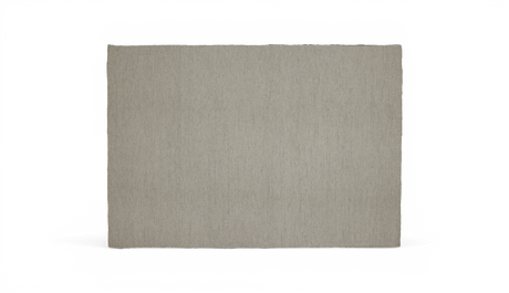 Rektangulært beige tæppe i neutral tone på hvid baggrund.
