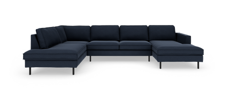 Mørkeblå modulsofa i U‑form med chaiselong i begge ender, fritstående mod hvid baggrund.