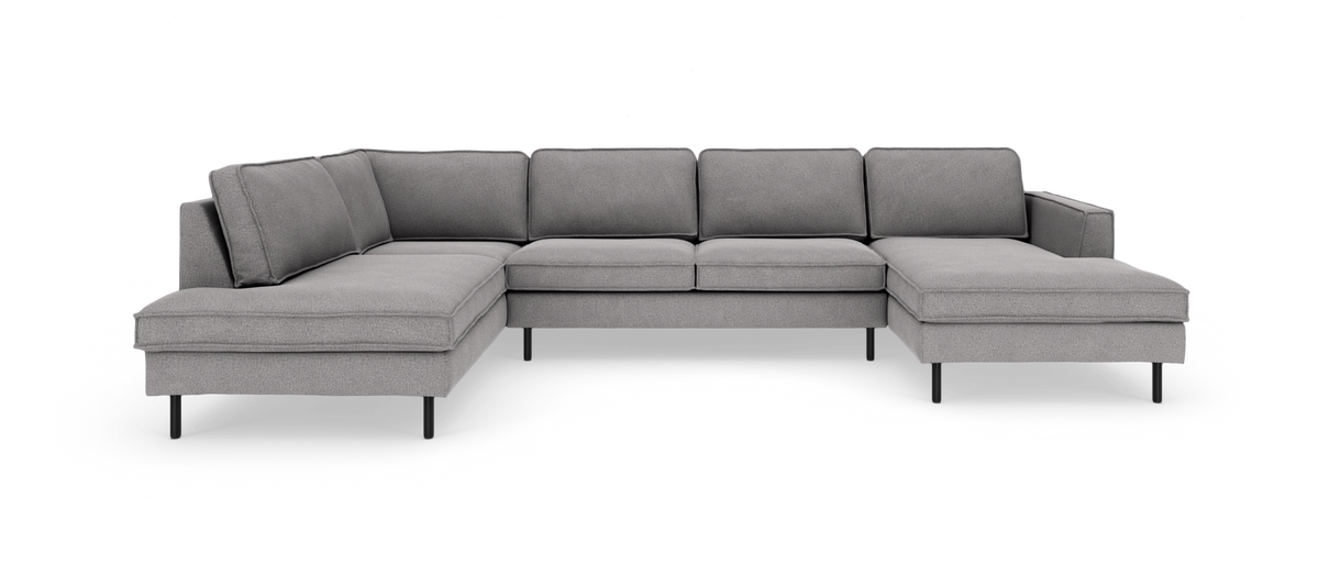 Grå U-formet modulsofa med chaiselong i begge ender og sorte metalben.
