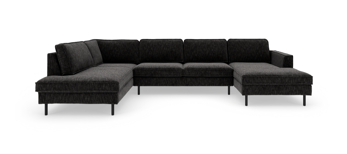 Mørkegrå U‑sofa med chaiselong i begge ender, fritlagt mod hvid baggrund.