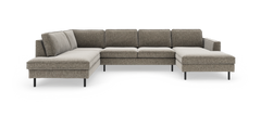 Stor hjørnesofa med chaiselonger på begge sider i gråbeige stof med slanke sorte ben.