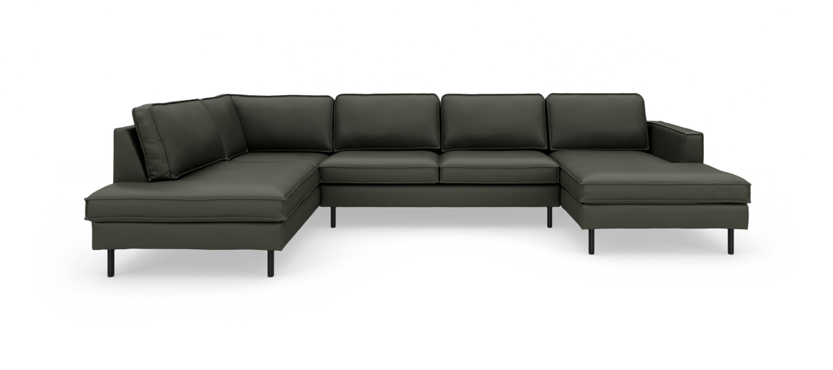 Mørkegrøn modulsofa i U‑form med chaiselonger på begge sider, frilagt mod hvid baggrund.