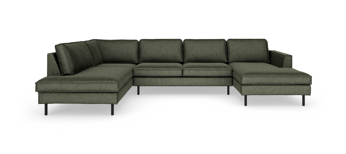 Grøn U-formet hjørnesofa med chaiselonger i begge ender og slanke sorte ben.