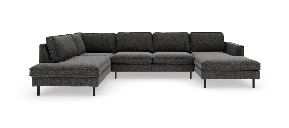 Mørkegrå modul-hjørnesofa med chaiselong til højre, fritstående på hvid baggrund.