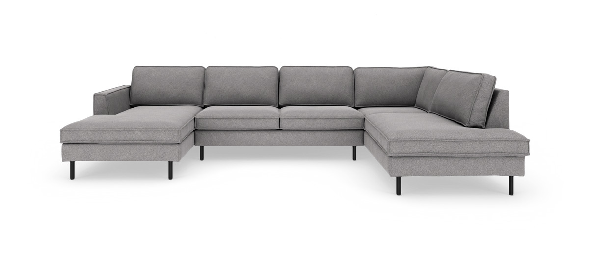 Grå U-formet modulsofa med chaiselong i begge ender, frilagt på hvid baggrund.
