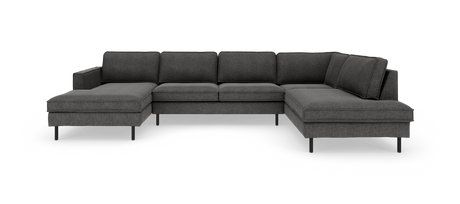 Mørkegrå U‑formet modulsofa med chaiselong i begge ender og slanke sorte ben.