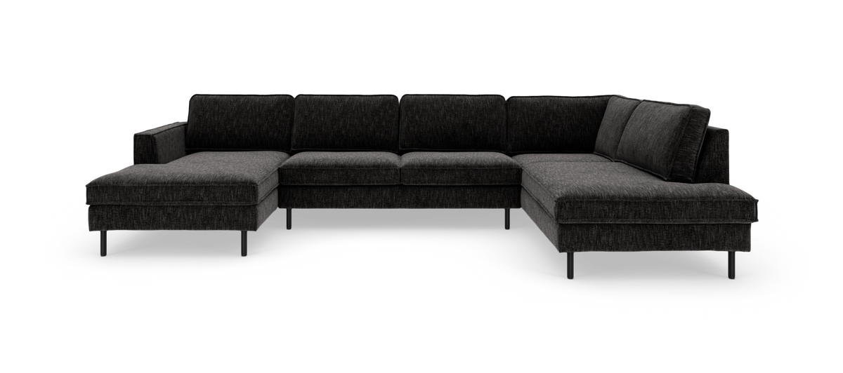 Mørkegrå U-formet modulsofa med chaiselong i begge ender, fritlagt på hvid baggrund.