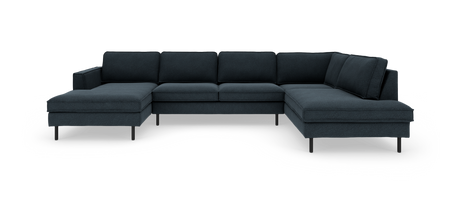 Mørkeblå U-formet modulsofa med chaiselong i begge ender og slanke sorte ben.