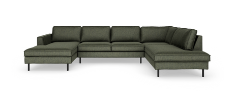 Stor U-formet hjørnesofa i mørkegrønt stof med slanke sorte ben.