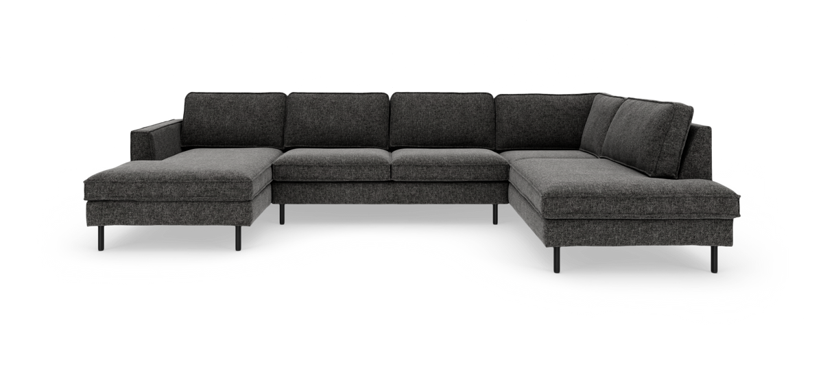 Mørkegrå U-formet modulsofa med chaiselong i begge ender og slanke metalben.