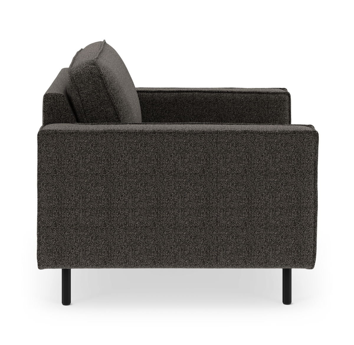 Mørkegrå stofsofa set fra siden på hvid baggrund.