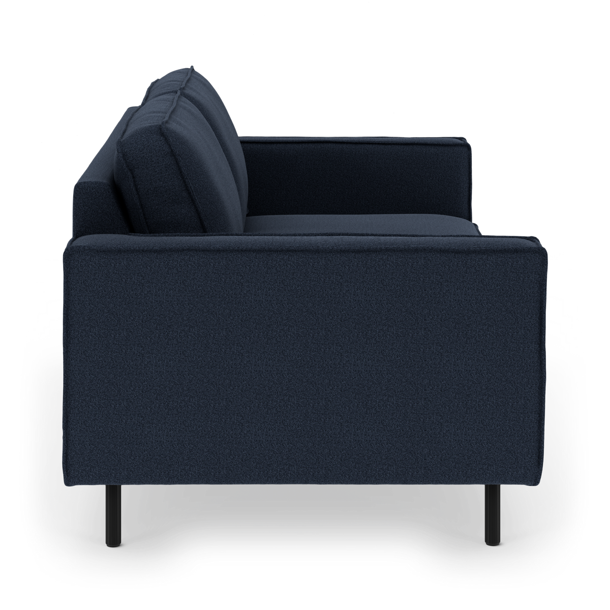 Sideview af mørkeblå sofa med slanke sorte ben, fritlagt mod hvid baggrund.