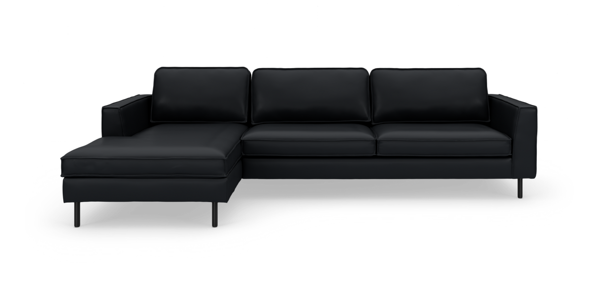 Sort læder hjørnesofa med venstrevendt chaiselong og slanke ben.