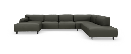 Mørkegrøn modulhjørnesofa i U‑form med chaiselong til venstre og bred chaiselong til højre, fotograferet mod hvid studiobaggrund.