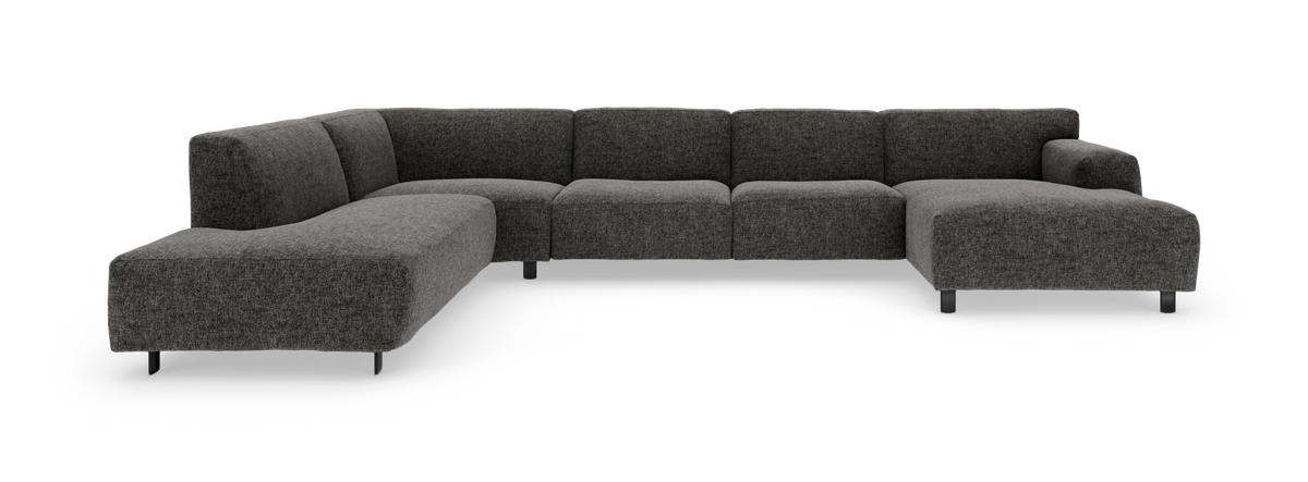 Stor modulhjørnesofa i mørkegråt stof med metalben, fritlagt på hvid baggrund.