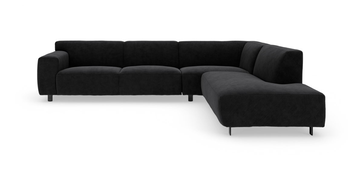 Sort L‑formet modulsofa med tekstureret stof og metalben, fotograferet i studie.