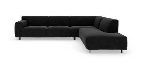 Sort L‑formet modulsofa med tekstureret stof og metalben, fotograferet i studie.