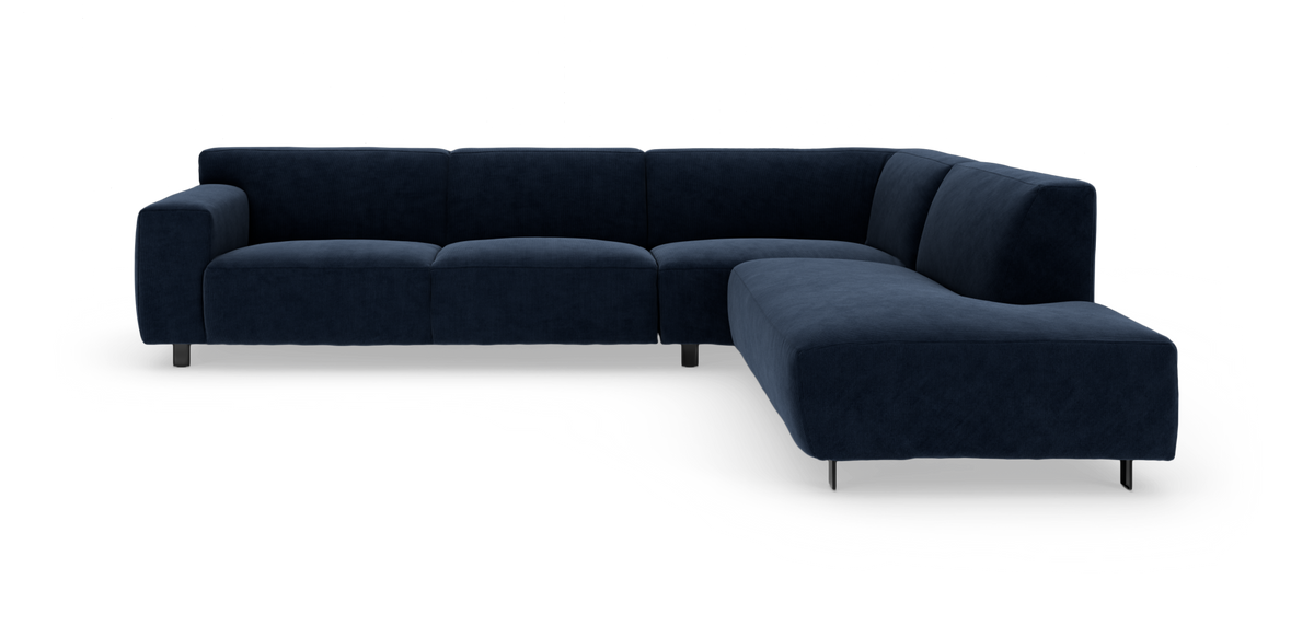 Mørkeblå L‑formet modulsofa med afrundede kanter og metalben, frilagt på hvid baggrund.