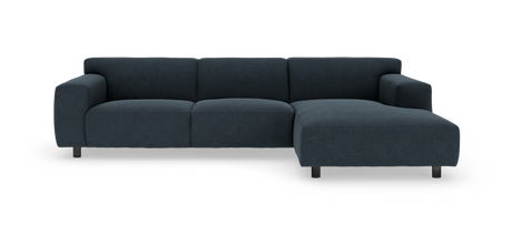 Mørkeblå L-formet hjørnesofa med chaiselong til højre, fritstående på hvid baggrund.