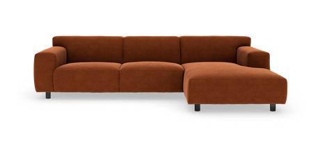 Modulsofa med højre chaiselong i rust-rød bouclé, frilagt på hvid baggrund.